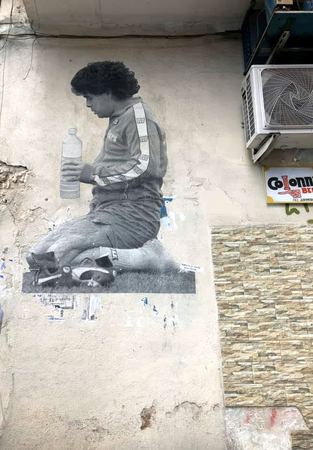 Seated Figure, Urban Wall — photograph by Randall Polito