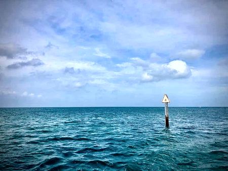 Turquoise Sea, Channel Marker — photograph by Randy Polito