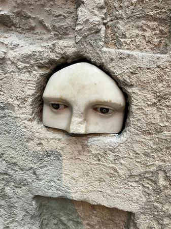 Carved Face, Stone Relief — photograph by Randy Polito
