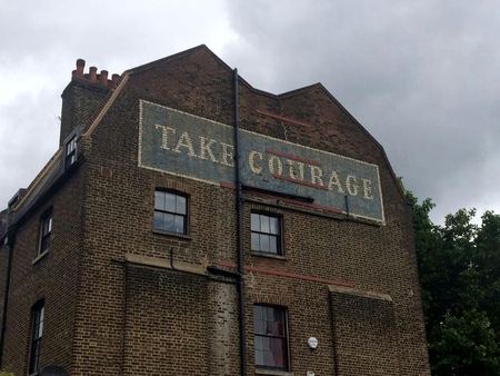 Take Courage, Brick Signage — photograph by Randy Polito