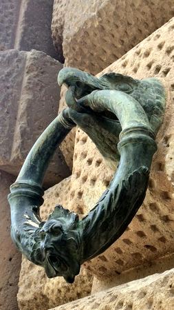 The Door Knocker, Bronze Ring — photograph by Randy Polito