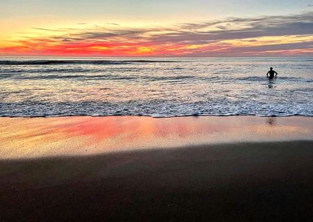 Sunset Swim, Ocean Horizon — photograph by Randall Polito