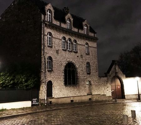 The Building at Night, Rain — photograph by Randall Polito