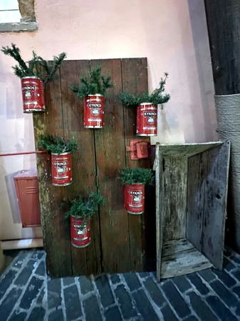 Red Cans, Rustic Wall — photograph by Randall Polito