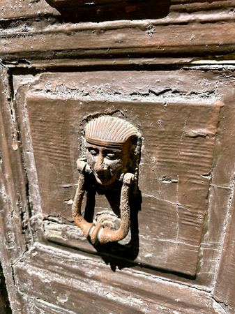 The Carved Door Knocker — photograph by Randall Polito