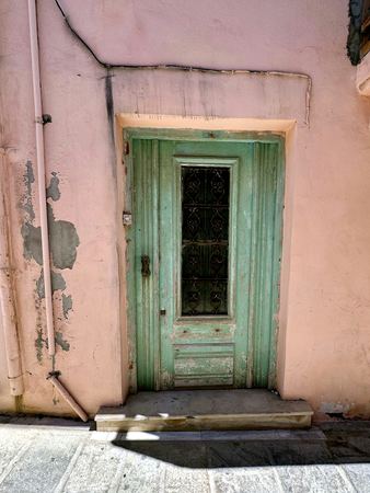 The Green Door, Pink Façade — photograph by Randy Polito