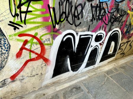 NIO, Wall Tags — photograph by Randall Polito