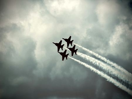 Jets Banking, Storm Clouds — photograph by Randall Polito