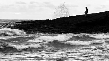 Solitary Figure, Crashing Waves — photograph by Randall Polito