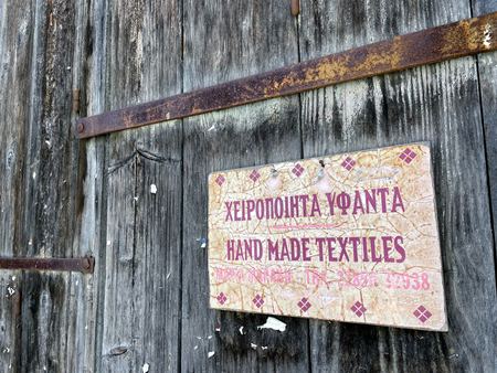 Hand Made Textiles, Wooden Sign — photograph by Randy Polito