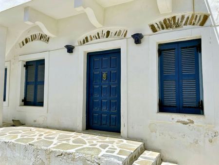 Blue Shutters, White Facade — photograph by Randall Polito