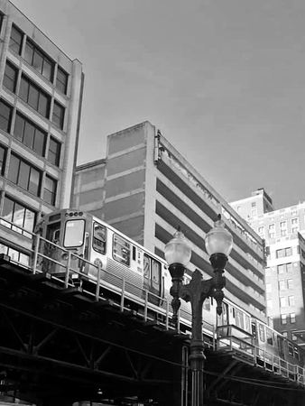 Elevated Train, City Buildings — photograph by Randall Polito
