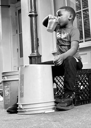 Boy with a Cup, Street Portrait — photograph by Randall Polito