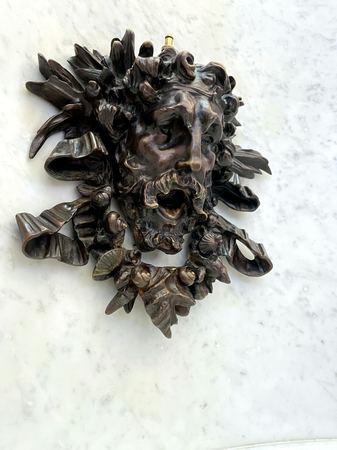 Bronze Mask, Wreath Relief — photograph by Randall Polito