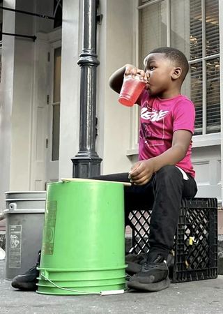 Boy with Red Drink, Street Portrait — photograph by Randy Polito
