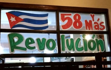 58 Mas Revolucion, Sign — photograph by Randall Polito