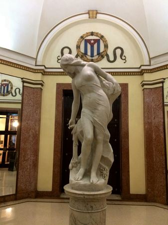 Statue in Alcove, Ornate Archway — photograph by Randy Polito