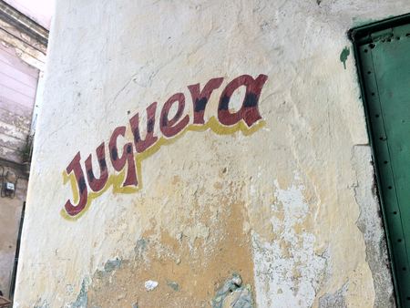 Juguera, Painted Sign — photograph by Randall Polito